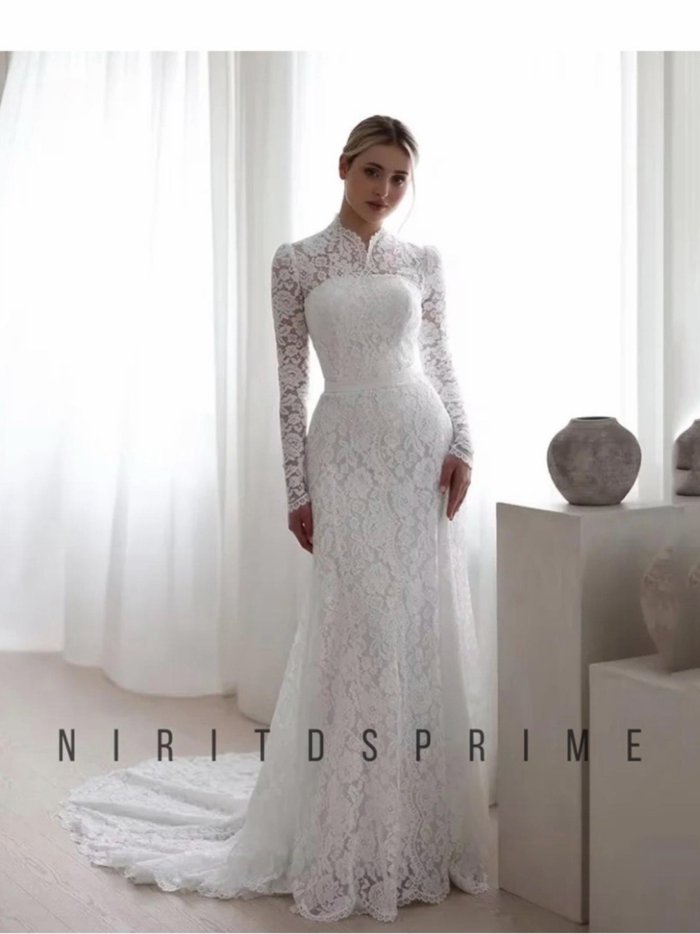 Elegant White Lace Long-Sleeve Bridal Gown
